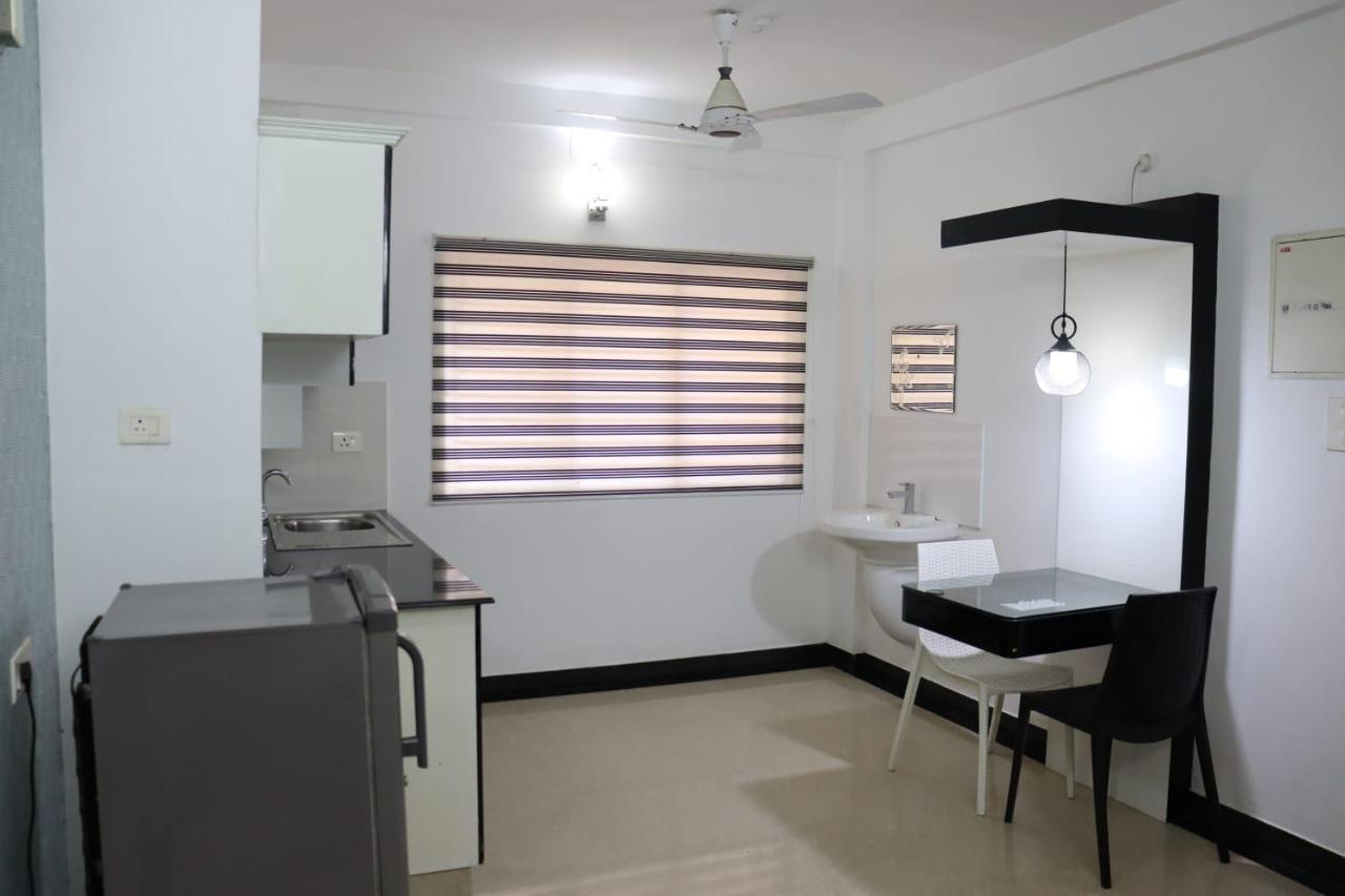 Hotel Uthradam Towers à Thiruvananthapuram Extérieur photo